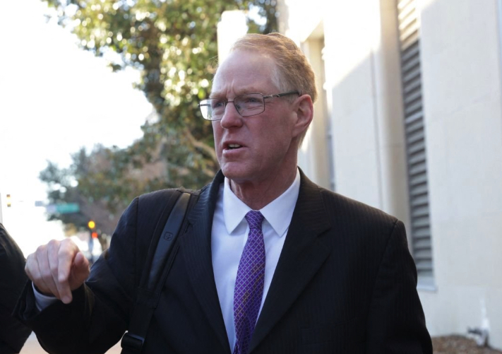 Attorney Paul Cassell arrives at court